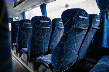 Blue comfortable seats in a luxury bus