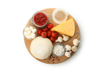 Dough and ingredients for cooking pizza isolated on white background