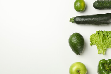 Vegetables and fruits on white background, space for text