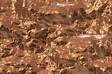 foil background with shiny uneven surface