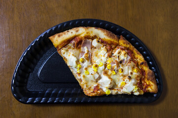 Slice of fresh Pizza with Sausage.