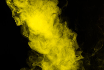 Yellow steam on a black background.