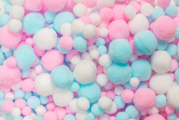 White, pink and blue soft pompons
