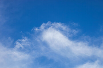 nature background., white clouds over blue sky soft focus.