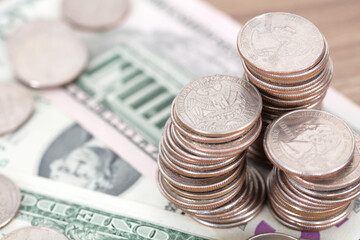 Dollar coins and dollar bills