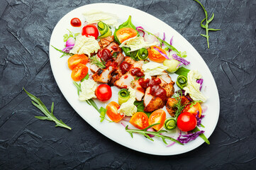 Salad with vegetables and meat steak