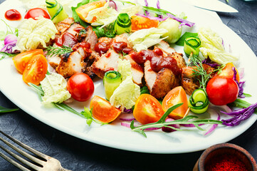 Meat salad with fresh vegetables.