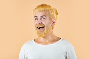 Bearded happy man, smile face. Barber with long beard and moustache in barbershop. Positive human facial expressions and emotions.