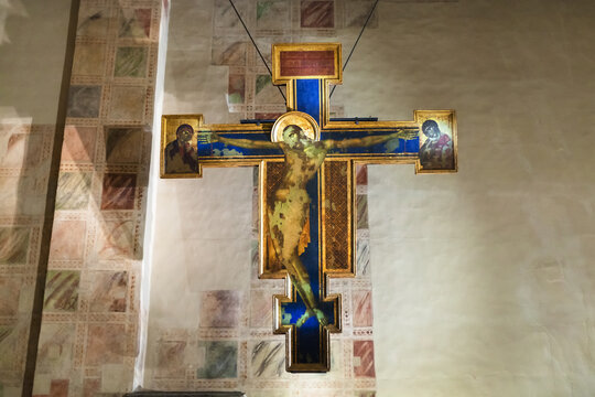 FLORENCE, ITALY - NOVEMBER 6, 2016: Crucifix in chapel of Basilica di Santa Croce (Basilica of the Holy Cross) in Florence city. The church is burial place of famous Italians.
