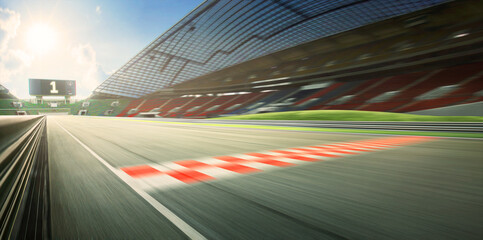 Sunrise motion blur effect asphalt international race track with starting or end line, digital...