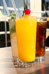 Summer refreshment vibes - colorful and tasty cold cocktails on the beach of Cyprus