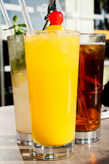 Summer refreshment vibes - colorful and tasty cold cocktails on the beach of Cyprus