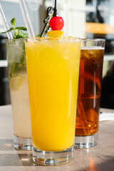 Summer refreshment vibes - colorful and tasty cold cocktails on the beach of Cyprus
