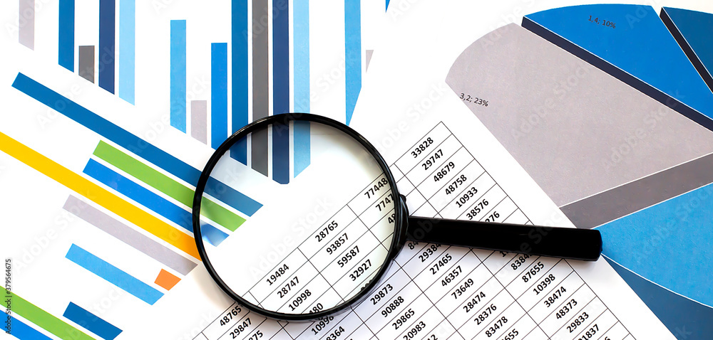 Poster many charts and graphs with magnifier. concept image of data gathering and statistical working.