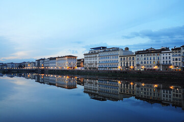 Evening view of townscape at the edges of the Arno river,  in Florence, Italy. Fiume Arno.