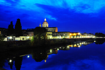 NIght view of Parrocchia S. Frediano in Cestello. Florence, Italy. Fiume Arno.