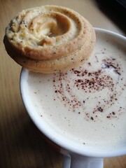 Сup of coffee with cookies