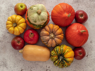 Autumn harvest. Ripe pumpkins and apples.