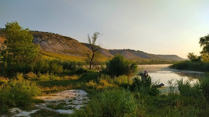 Obraz premium sunrise over the river