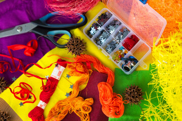 Felt and threads in bright autumn colors and accessories for crafts and handmade