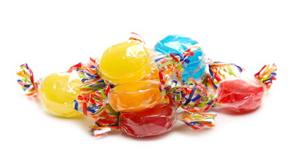 Colorful candies with transparent cellophane wrapping, sweets pile isolated on white background 