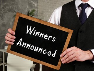 Financial concept meaning Winners Announced with inscription on the page.
