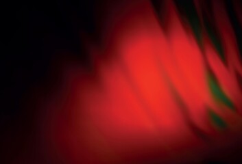 Dark Orange vector blurred shine abstract background.