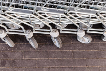 Row of shopping trolleys.