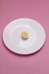 traditional healthy italian food. Tasty and fresh brown chicken eggs, raw and cooked, with their yellow yolk and egg white. Protein breakfast. Natural healthy food and organic farming concept.