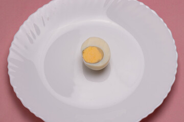traditional healthy italian food. Tasty and fresh brown chicken eggs, raw and cooked, with their yellow yolk and egg white. Protein breakfast. Natural healthy food and organic farming concept.