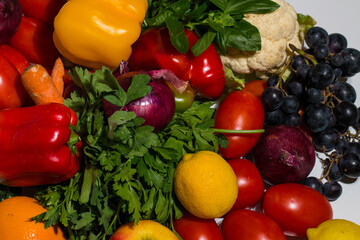 Background of vegetables different fresh farm vegetables. Food or Healthy diet concept. Composition with assorted raw organic vegetables. detox diet: lemon, tomato, pepper, cauliflower, apple, grape
