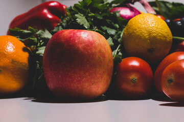Background of vegetables different fresh farm vegetables. Food or Healthy diet concept. Composition with assorted raw organic vegetables. detox diet: lemon, tomato, pepper, cauliflower, apple, grape