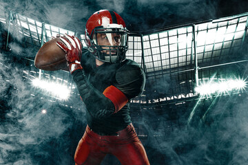American football player, athlete sportsman in red helmet on stadium background. Sport and motivation wallpaper.
