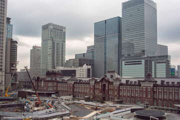 Fototapeta na wymiar Tokyo Station view from Kitte Building with ongoing construction
