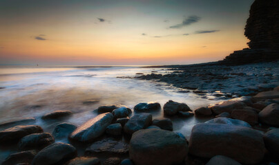 Sunset over the rocks at Nash Point on the Heritage coast in Glamorgan, South Wales, UK
