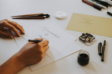 Calligraphy artist working on a project.