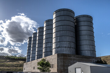 Garrison Dam Powerhouse and other assorted building, tanks around and attached to Dam in North Dakota.