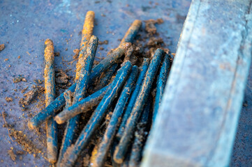 metal stud, fasteOld metal studs covered in rust, close-up, selective focus.ning part, rust