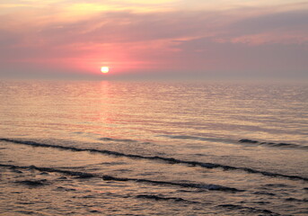 the sun is sinking in the Baltic Sea