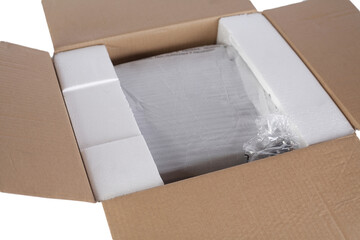 Open cardboard with styrofoam material. Isolated on white background. Transportation of fragile...
