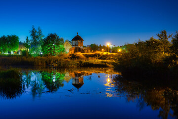 Fototapeta na wymiar Beautiful scenery at the settlement of Trade Factory in Pruszcz Gdanski at night, Poland.