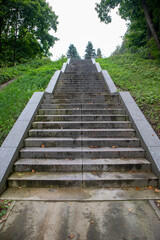 Photo of a long granite staircase in the park