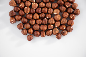 healthy hazelnuts on white background