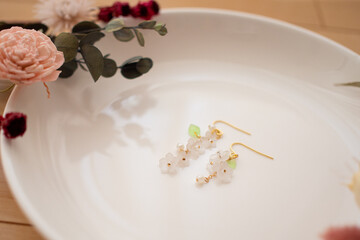 Handmade flower earrings made from Praban