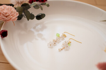 Handmade flower earrings made from Praban