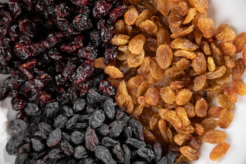 healthy dried fruits on white background