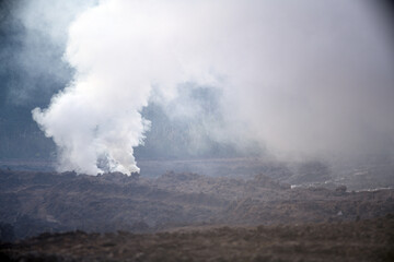 Fototapeta na wymiar A smoke bomb on the battlefield. Smoke bombs action.