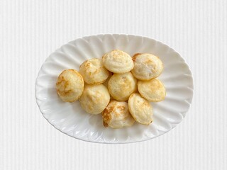 guliyappas or Poddu/Guntaponganaalu being served for breakfast in a plate