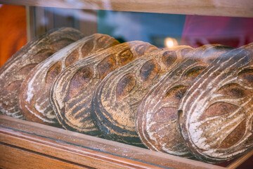 Bread loaves on display at an artisan bakery in Broadway market, London