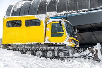 Ski resort service, yellow mobile rescue car